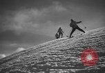 Image of skiing United States USA, 1941, second 31 stock footage video 65675076393