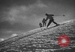 Image of skiing United States USA, 1941, second 33 stock footage video 65675076393