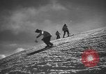 Image of skiing United States USA, 1941, second 35 stock footage video 65675076393