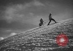 Image of skiing United States USA, 1941, second 39 stock footage video 65675076393