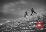 Image of skiing United States USA, 1941, second 40 stock footage video 65675076393