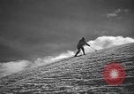 Image of skiing United States USA, 1941, second 30 stock footage video 65675076394