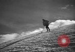Image of skiing United States USA, 1941, second 33 stock footage video 65675076394