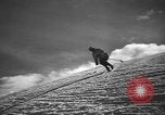 Image of skiing United States USA, 1941, second 34 stock footage video 65675076394