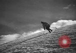 Image of skiing United States USA, 1941, second 35 stock footage video 65675076394