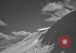 Image of skiing United States USA, 1941, second 25 stock footage video 65675076395
