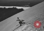 Image of skiing United States USA, 1941, second 27 stock footage video 65675076395