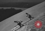 Image of skiing United States USA, 1941, second 30 stock footage video 65675076395