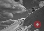 Image of skiing United States USA, 1941, second 38 stock footage video 65675076395