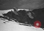 Image of skiing United States USA, 1941, second 34 stock footage video 65675076396