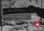 Image of US soldiers playing craps Italy, 1945, second 5 stock footage video 65675076405