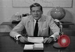 Image of Enactment of weather broadcast Bermuda, 1955, second 33 stock footage video 65675076447