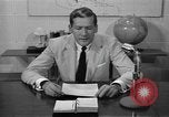 Image of Enactment of weather broadcast Bermuda, 1955, second 42 stock footage video 65675076447