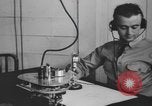Image of U.S. flying cadet learning instrument flying in a Link trainer Texas USA, 1940, second 28 stock footage video 65675076484