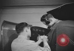 Image of U.S. flying cadet learning instrument flying in a Link trainer Texas USA, 1940, second 40 stock footage video 65675076484