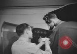 Image of U.S. flying cadet learning instrument flying in a Link trainer Texas USA, 1940, second 42 stock footage video 65675076484