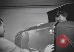 Image of U.S. flying cadet learning instrument flying in a Link trainer Texas USA, 1940, second 45 stock footage video 65675076484