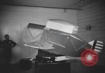 Image of U.S. flying cadet learning instrument flying in a Link trainer Texas USA, 1940, second 60 stock footage video 65675076484