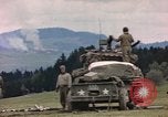 Image of U.S tank shells a German village at end of World War II Germany, 1945, second 9 stock footage video 65675076623