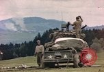 Image of U.S tank shells a German village at end of World War II Germany, 1945, second 10 stock footage video 65675076623