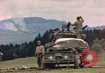 Image of U.S tank shells a German village at end of World War II Germany, 1945, second 12 stock footage video 65675076623
