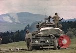 Image of U.S tank shells a German village at end of World War II Germany, 1945, second 13 stock footage video 65675076623