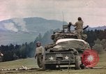 Image of U.S tank shells a German village at end of World War II Germany, 1945, second 14 stock footage video 65675076623