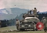 Image of U.S tank shells a German village at end of World War II Germany, 1945, second 15 stock footage video 65675076623