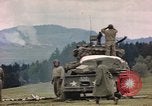 Image of U.S tank shells a German village at end of World War II Germany, 1945, second 16 stock footage video 65675076623