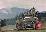 Image of U.S tank shells a German village at end of World War II Germany, 1945, second 17 stock footage video 65675076623