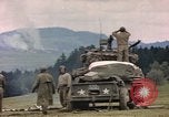 Image of U.S tank shells a German village at end of World War II Germany, 1945, second 19 stock footage video 65675076623