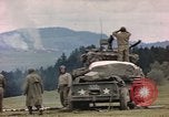 Image of U.S tank shells a German village at end of World War II Germany, 1945, second 20 stock footage video 65675076623