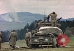 Image of U.S tank shells a German village at end of World War II Germany, 1945, second 21 stock footage video 65675076623