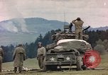 Image of U.S tank shells a German village at end of World War II Germany, 1945, second 22 stock footage video 65675076623