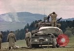 Image of U.S tank shells a German village at end of World War II Germany, 1945, second 23 stock footage video 65675076623
