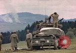 Image of U.S tank shells a German village at end of World War II Germany, 1945, second 25 stock footage video 65675076623