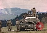 Image of U.S tank shells a German village at end of World War II Germany, 1945, second 26 stock footage video 65675076623