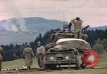 Image of U.S tank shells a German village at end of World War II Germany, 1945, second 27 stock footage video 65675076623