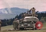 Image of U.S tank shells a German village at end of World War II Germany, 1945, second 29 stock footage video 65675076623