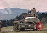 Image of U.S tank shells a German village at end of World War II Germany, 1945, second 31 stock footage video 65675076623