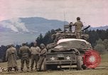 Image of U.S tank shells a German village at end of World War II Germany, 1945, second 32 stock footage video 65675076623
