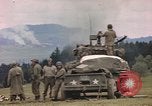 Image of U.S tank shells a German village at end of World War II Germany, 1945, second 33 stock footage video 65675076623