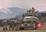 Image of U.S tank shells a German village at end of World War II Germany, 1945, second 34 stock footage video 65675076623