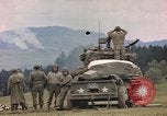 Image of U.S tank shells a German village at end of World War II Germany, 1945, second 35 stock footage video 65675076623