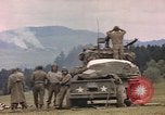 Image of U.S tank shells a German village at end of World War II Germany, 1945, second 36 stock footage video 65675076623