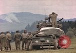 Image of U.S tank shells a German village at end of World War II Germany, 1945, second 38 stock footage video 65675076623