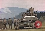 Image of U.S tank shells a German village at end of World War II Germany, 1945, second 40 stock footage video 65675076623
