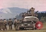 Image of U.S tank shells a German village at end of World War II Germany, 1945, second 44 stock footage video 65675076623