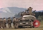 Image of U.S tank shells a German village at end of World War II Germany, 1945, second 45 stock footage video 65675076623