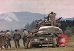 Image of U.S tank shells a German village at end of World War II Germany, 1945, second 46 stock footage video 65675076623